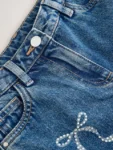 Mid Blue Bow Embellished Barrel Jeans
